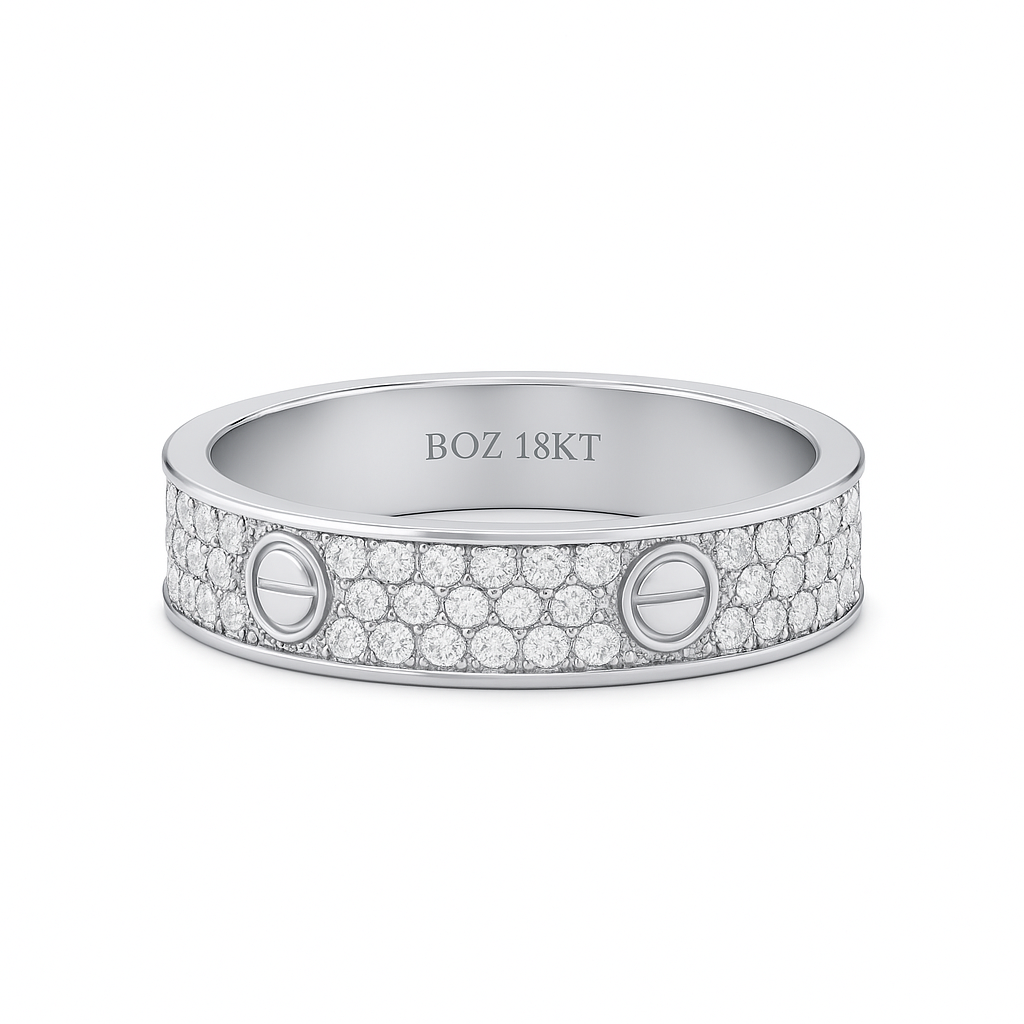 Silver ring with diamond accents and 'BOZ 18KT' marking on a white background