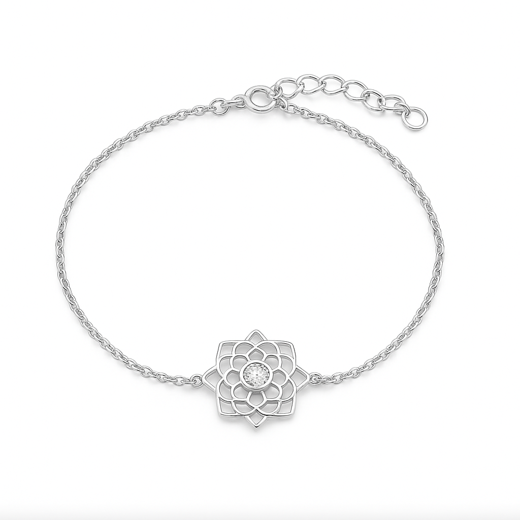 Silver bracelet with a floral design on a white background
