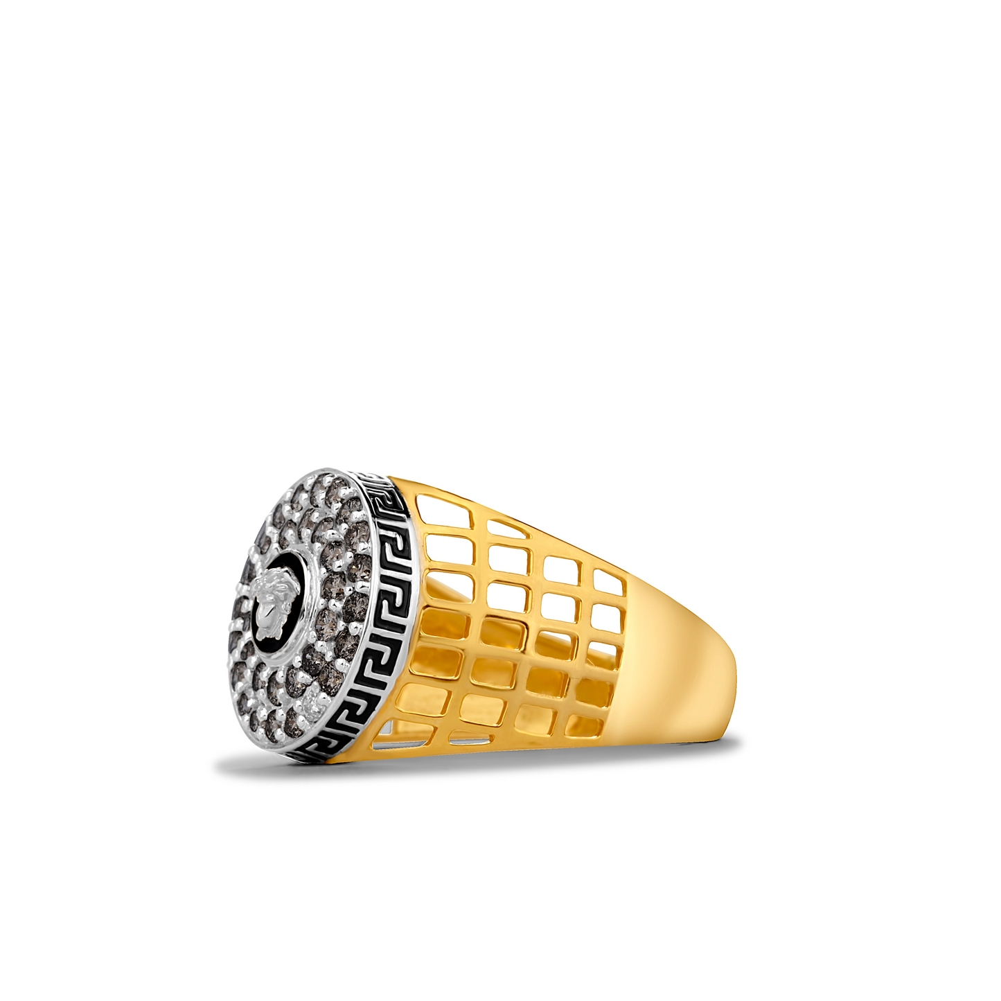 Gold and silver ring with a distinctive design on a white background