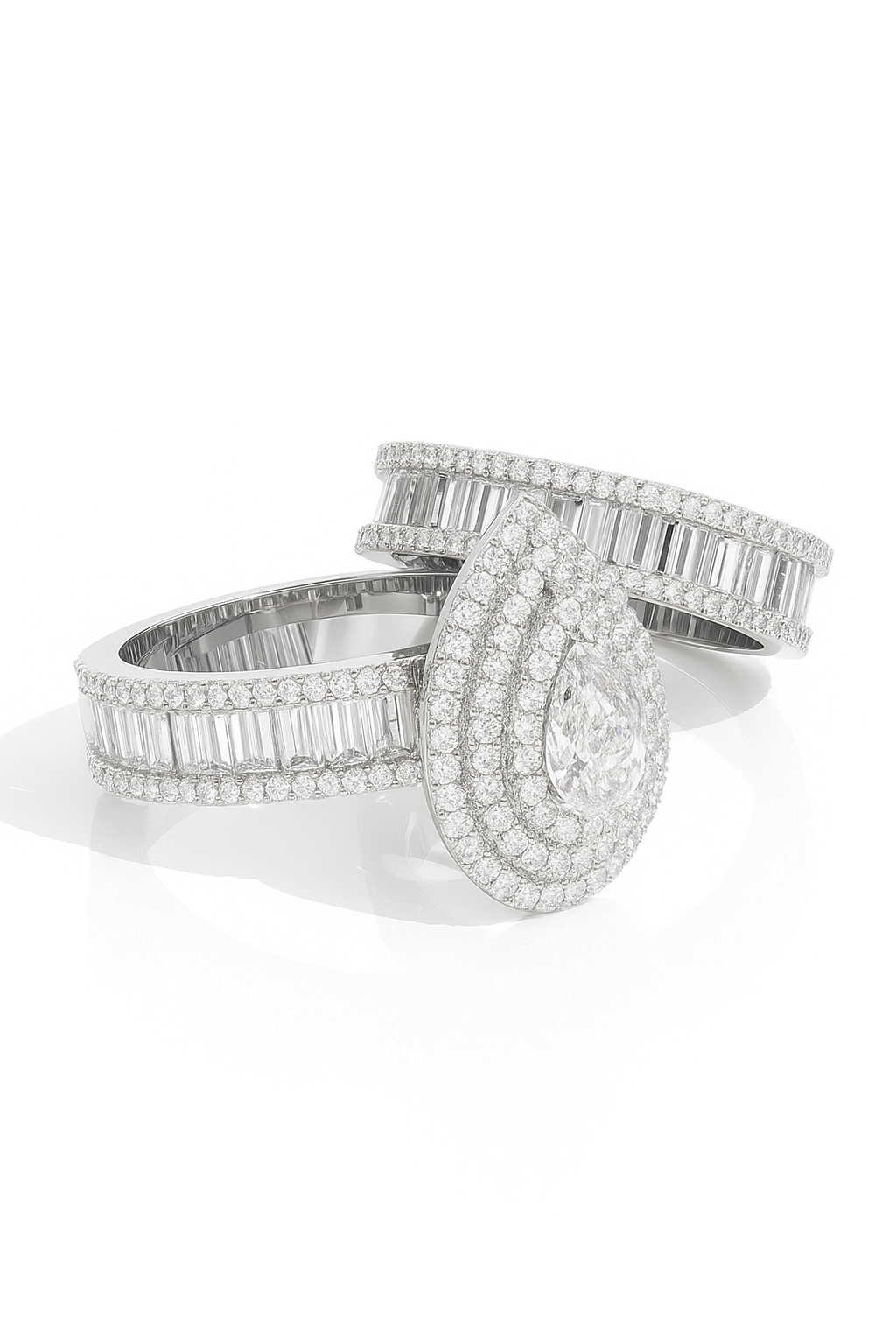 Two diamond rings stacked on a white background