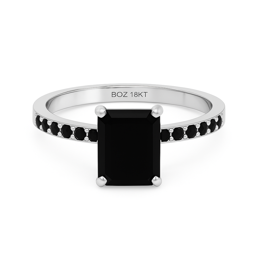 Silver ring with a black gemstone and 'BOZ 18KT' marking on a white background