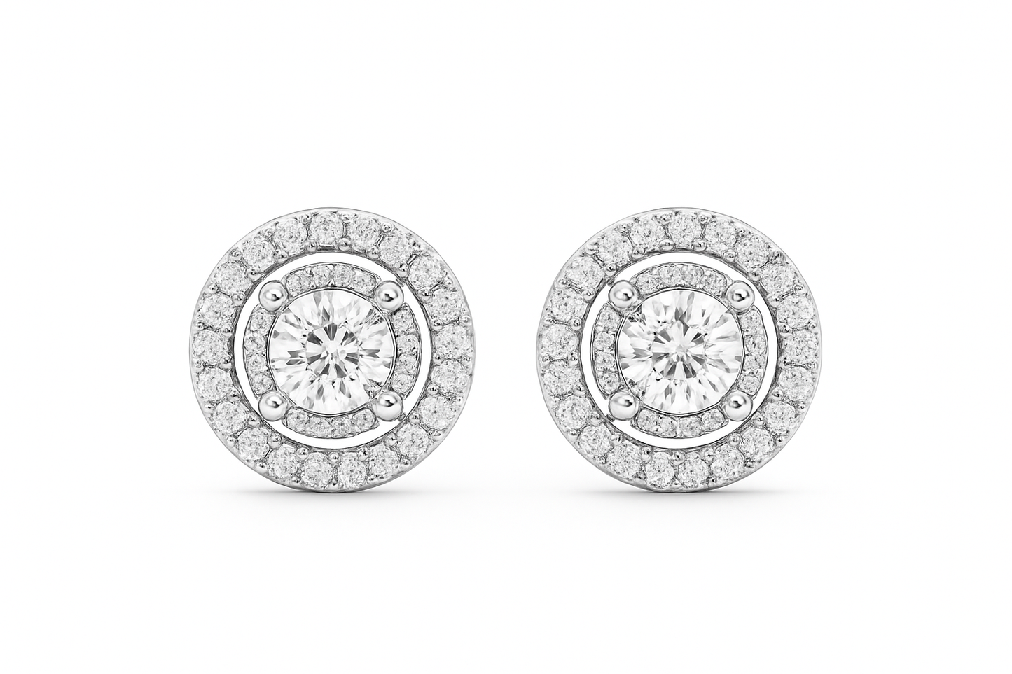 Pair of diamond earrings on a white background