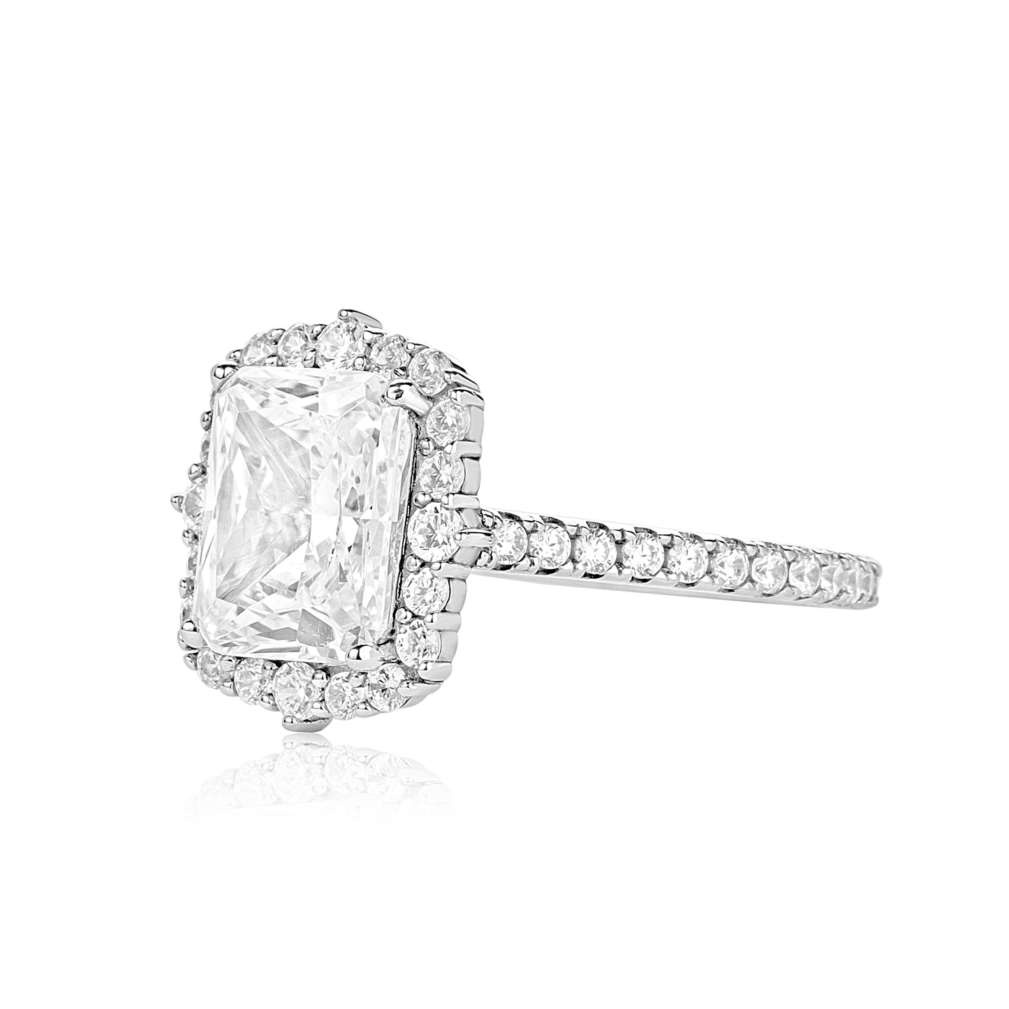 Diamond ring with a rectangular center stone on a white background