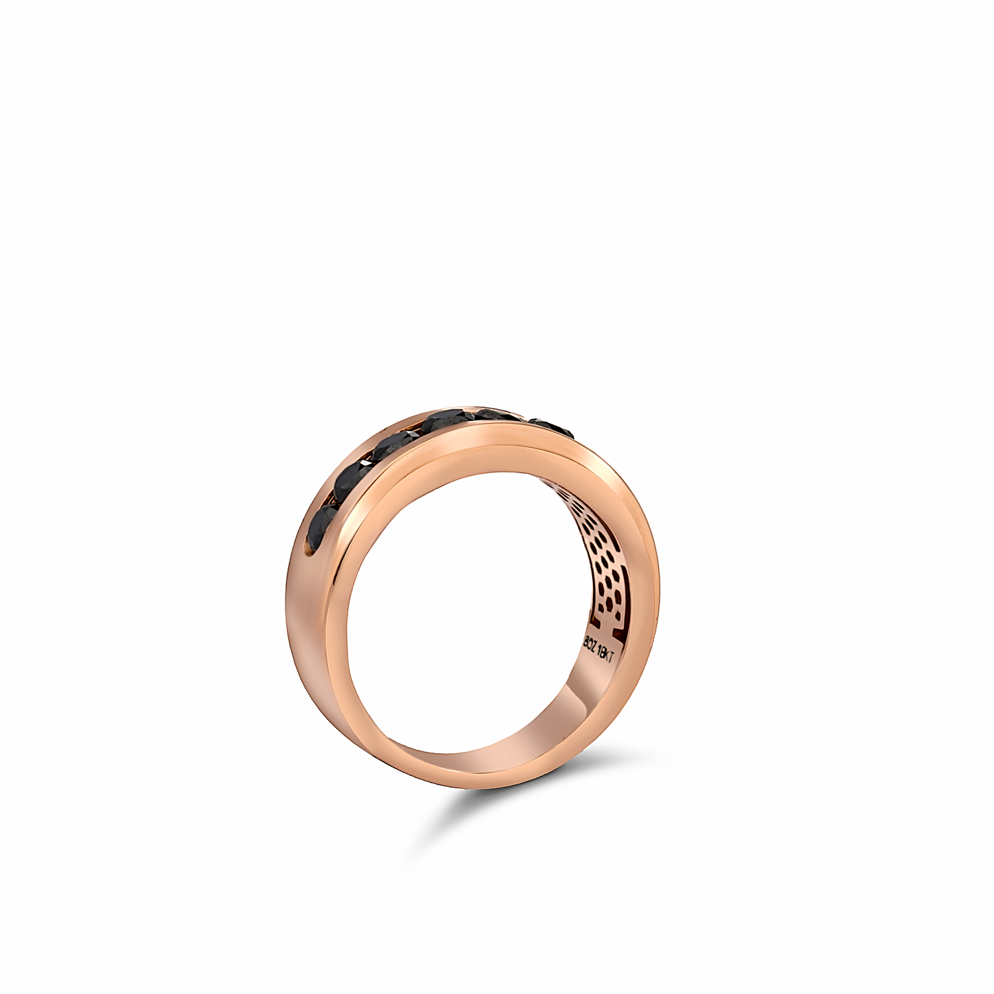 Rose gold ring with black gemstone on a white background