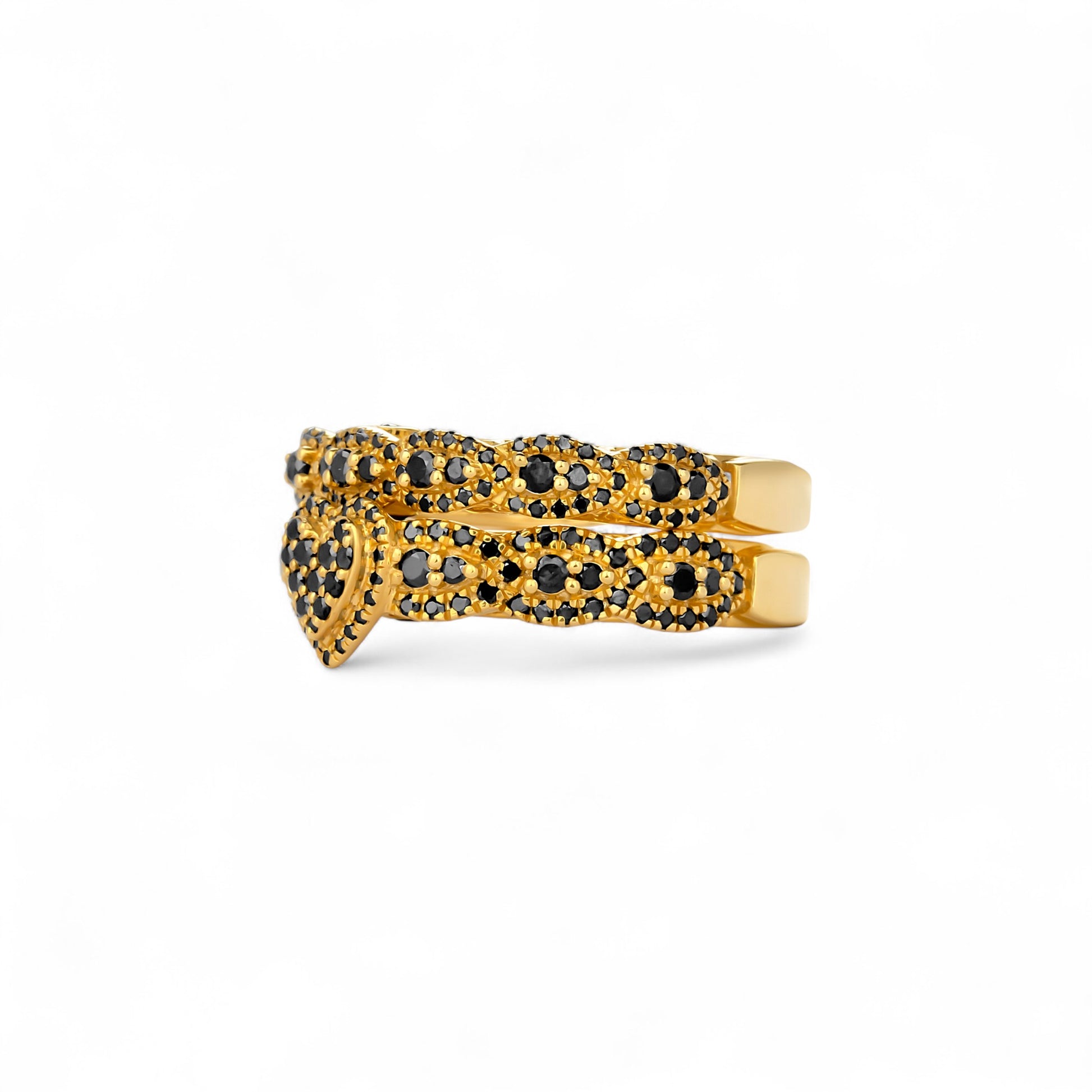 Gold and black gemstone ring on a white background