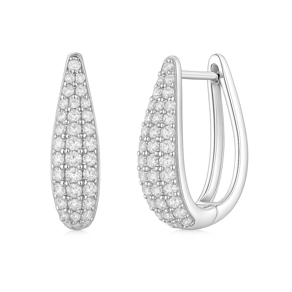 Silver hoop earrings with clear gemstones on a white background
