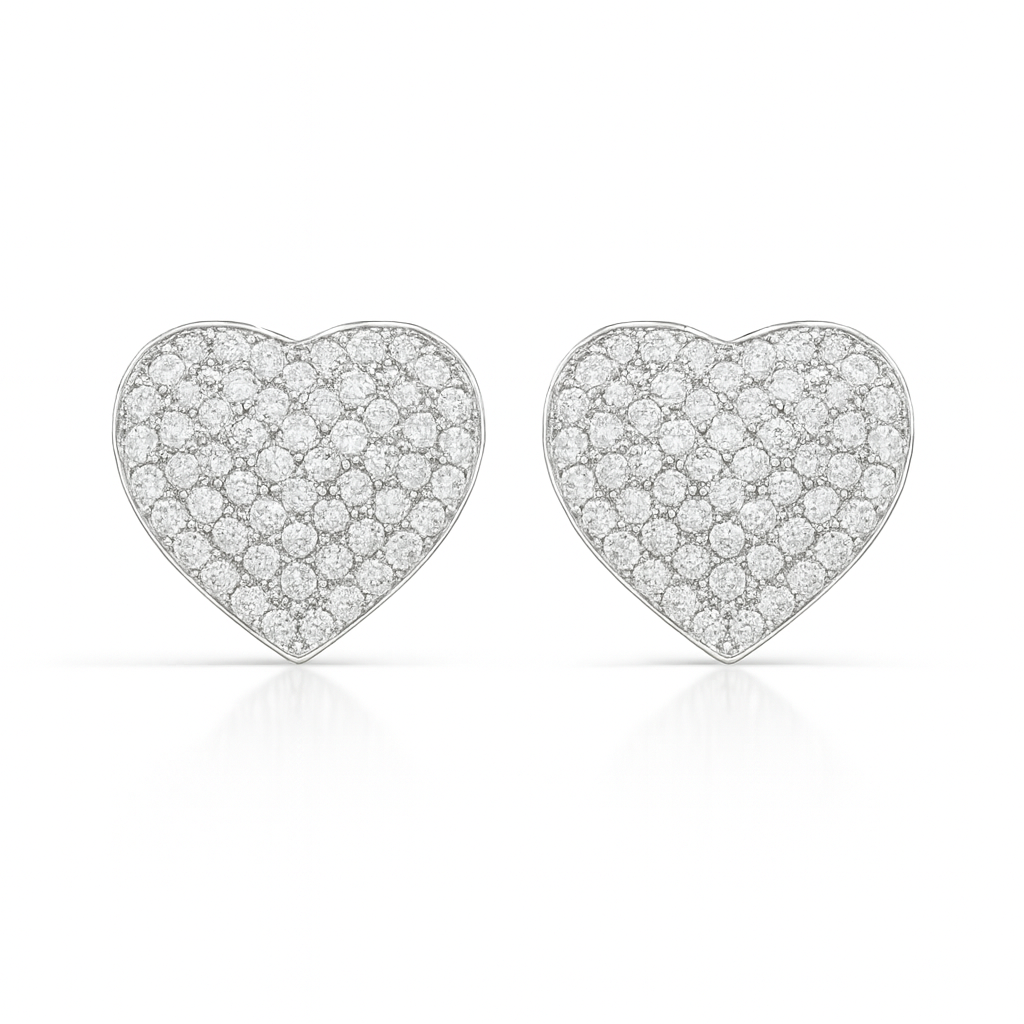 Heart-shaped diamond earrings on a white background
