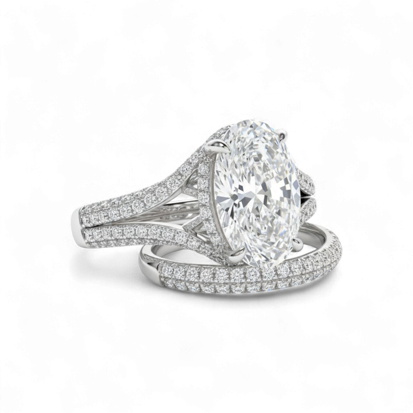 Diamond ring with a large central gemstone and smaller stones on a white background