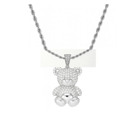 Silver teddy bear pendant on a chain against a white background
