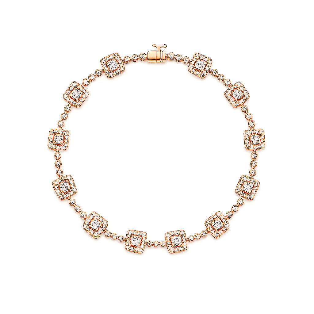 Rose gold bracelet with diamond accents on a white background