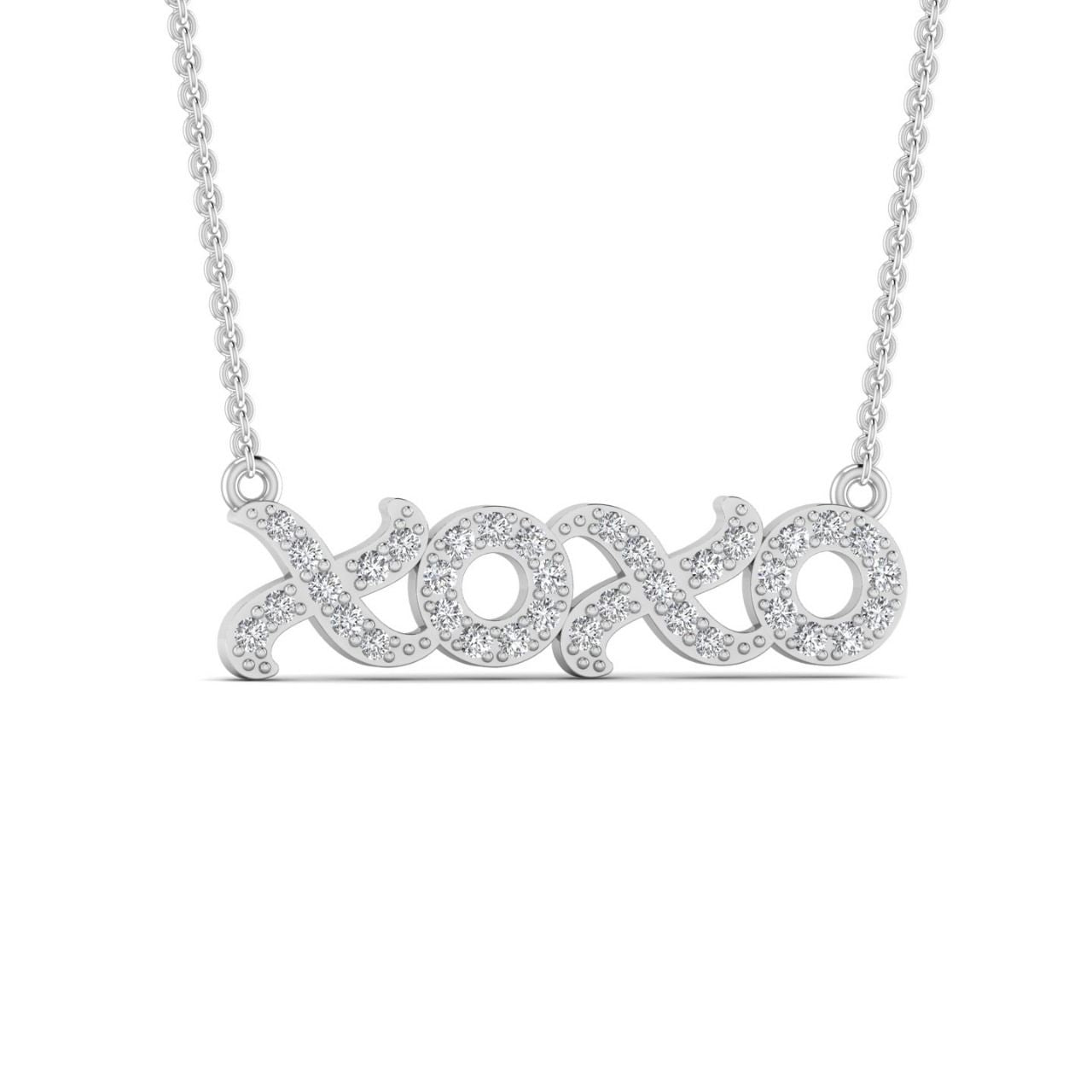 A 18 karat gold necklace with a natural diamond pendant in the shape of the letters 'XO'.