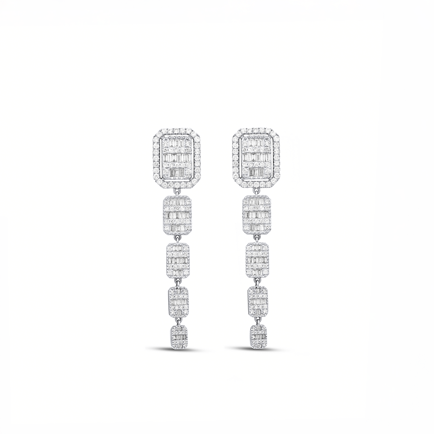 Pair of diamond earrings on a white background