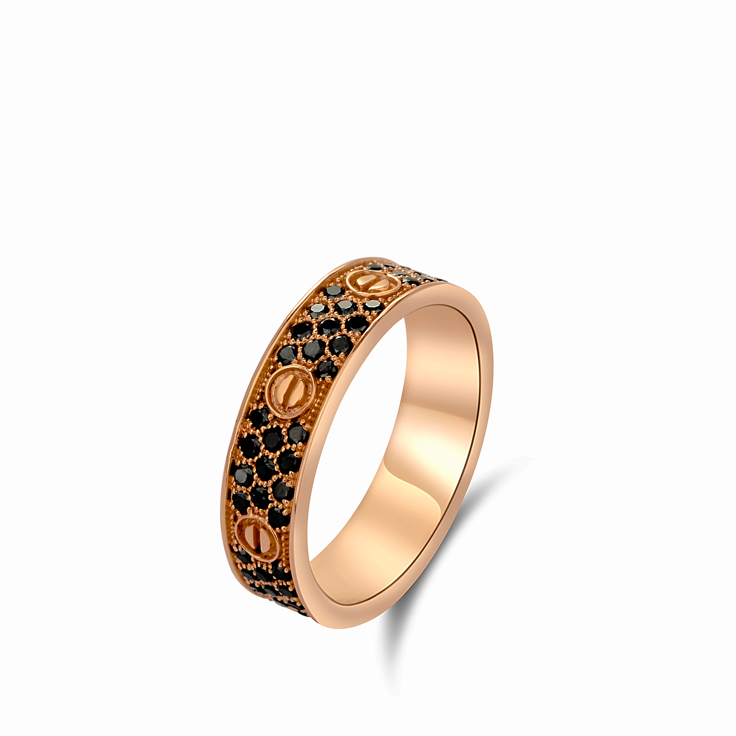 Rose gold ring with black gemstones on a white background