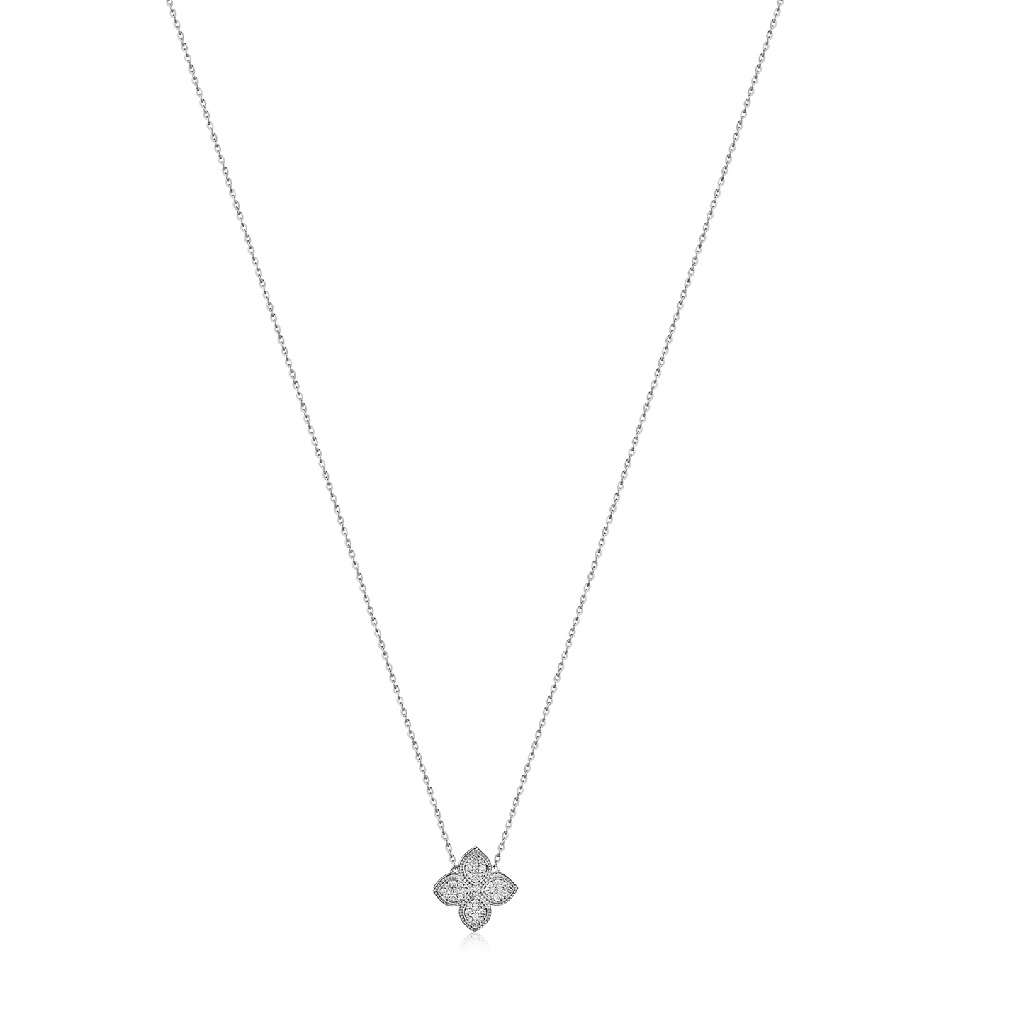 An image of a simple yet elegant necklace with a round diamond pendant on a chain.
