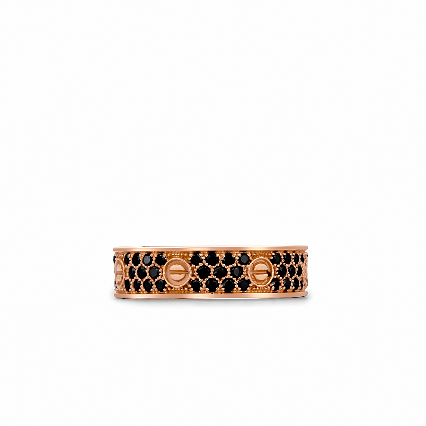 Rose gold ring with black gemstones on a white background