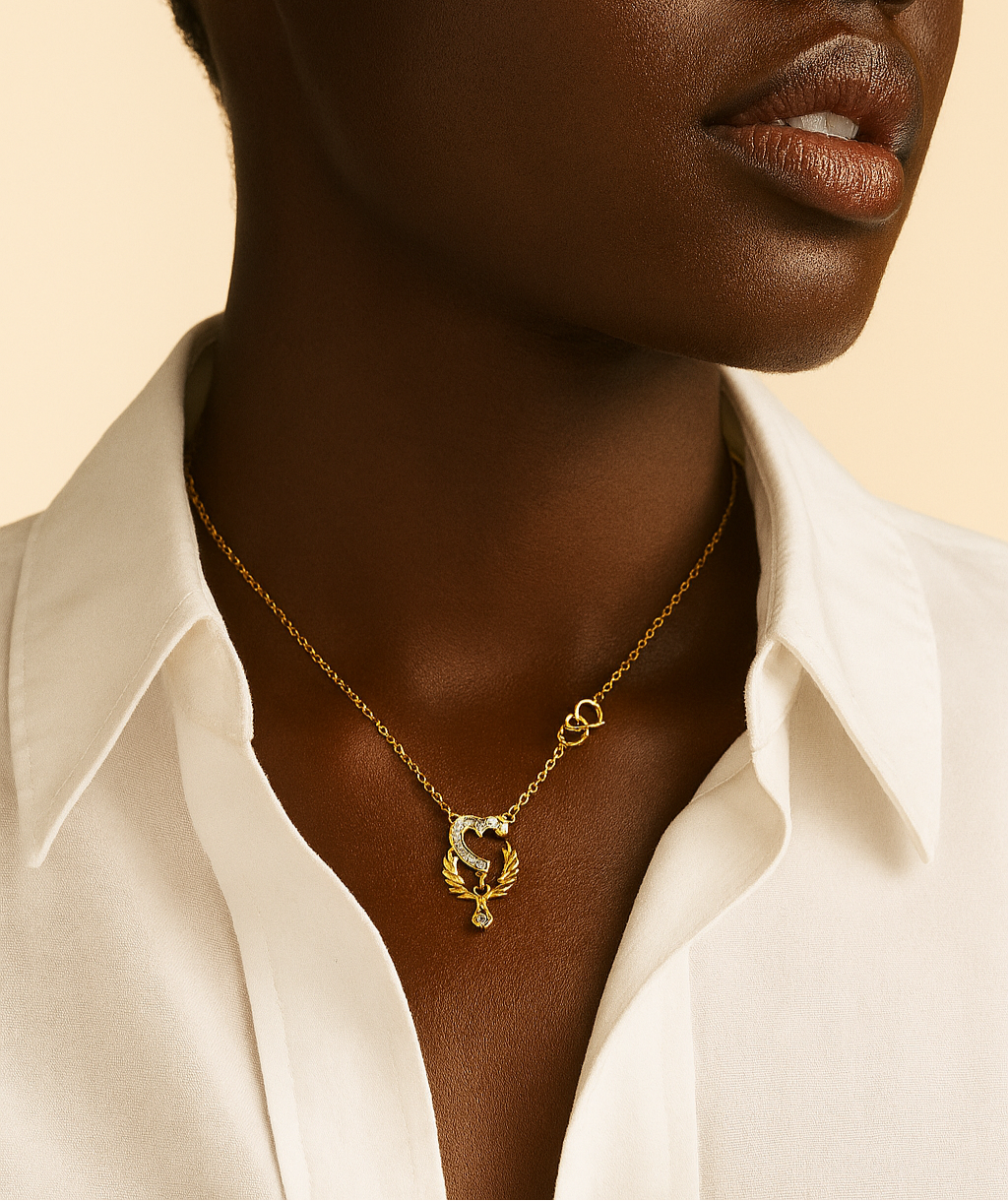 Woman wearing a gold necklace with a white shirt on a beige background