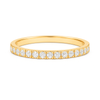 Gold ring with small diamonds on a white background