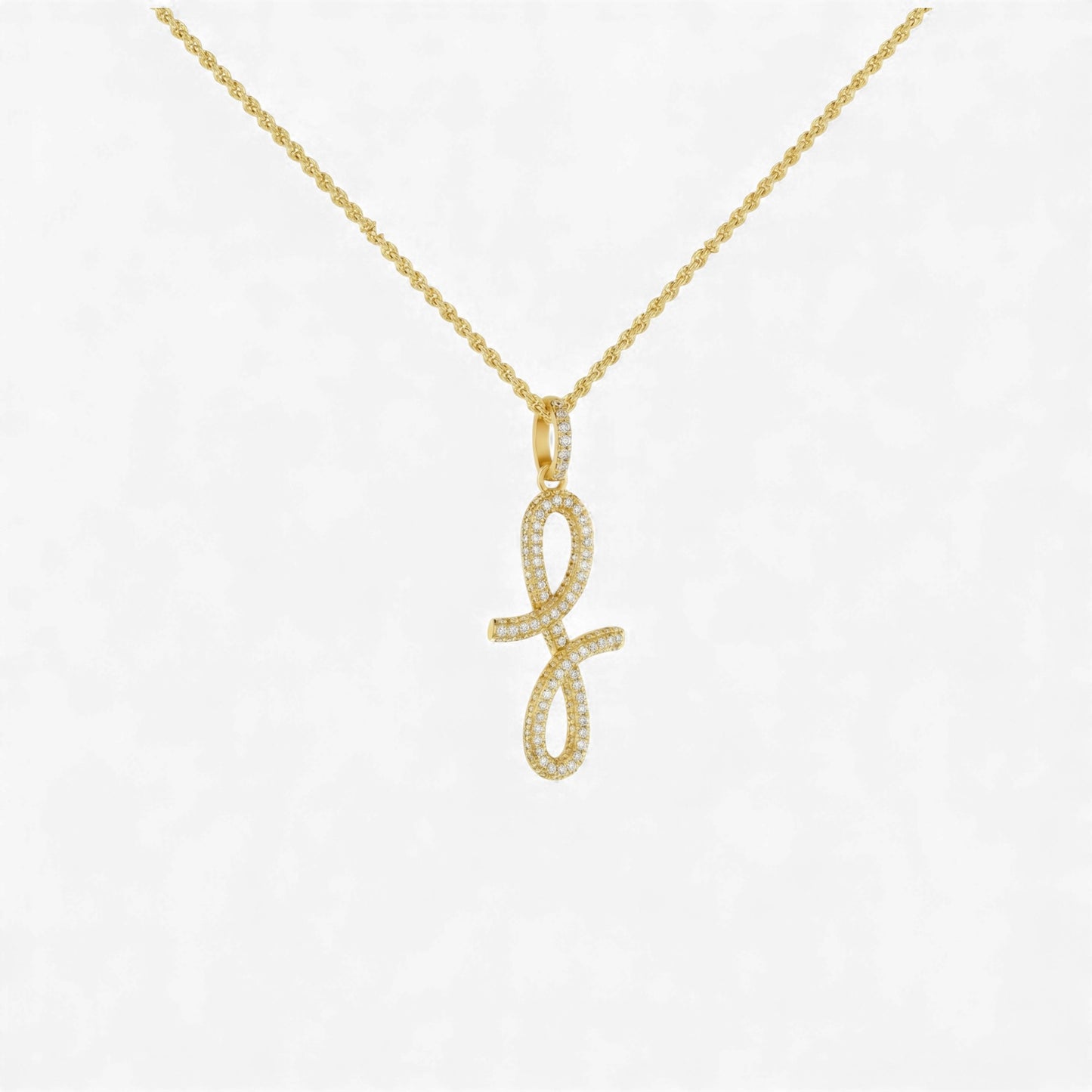 Gold necklace with a unique pendant on a white background