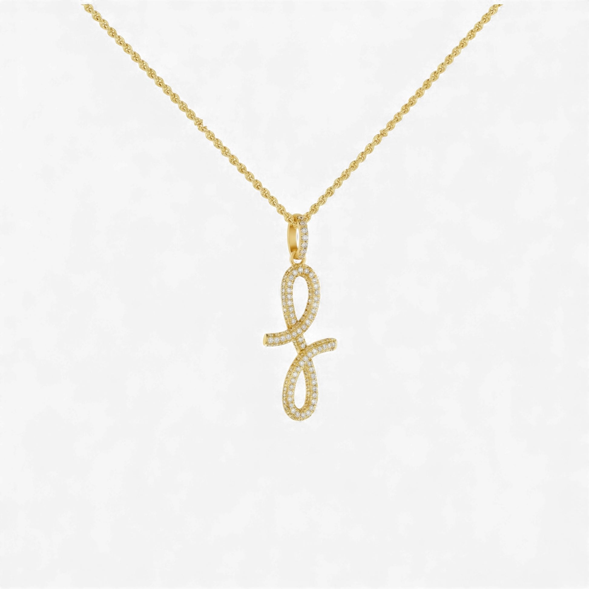 Gold necklace with a unique pendant on a white background