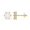 A pair of 18 karat gold diamond stud earrings with a clear and yellow gold setting.