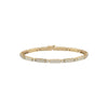 Gold bracelet with embedded diamonds on a white background