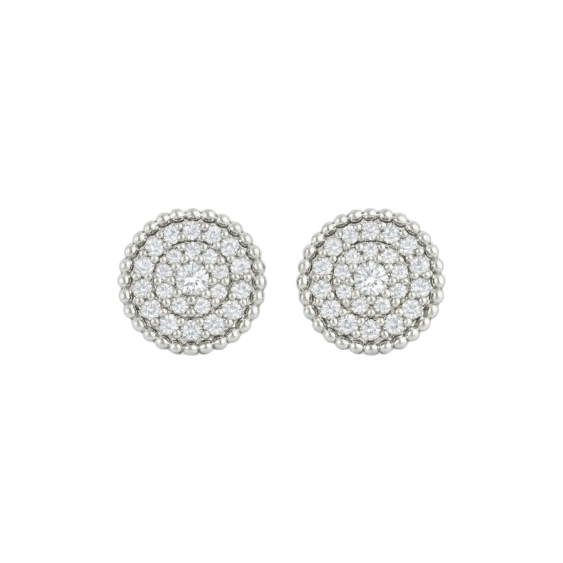 Pair of pearl earrings on a white background