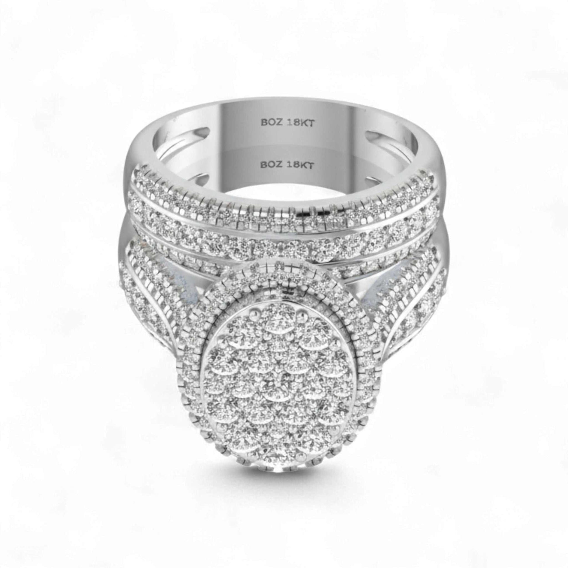 Silver ring with diamond accents on a white background