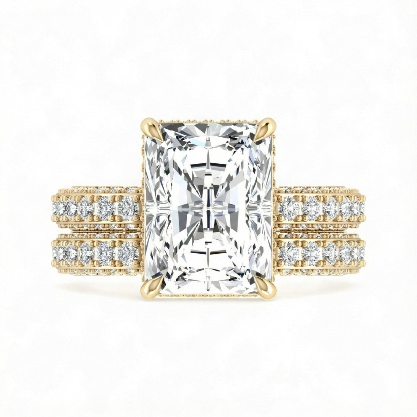 Gold ring with a large diamond and smaller diamonds on the band against a white background