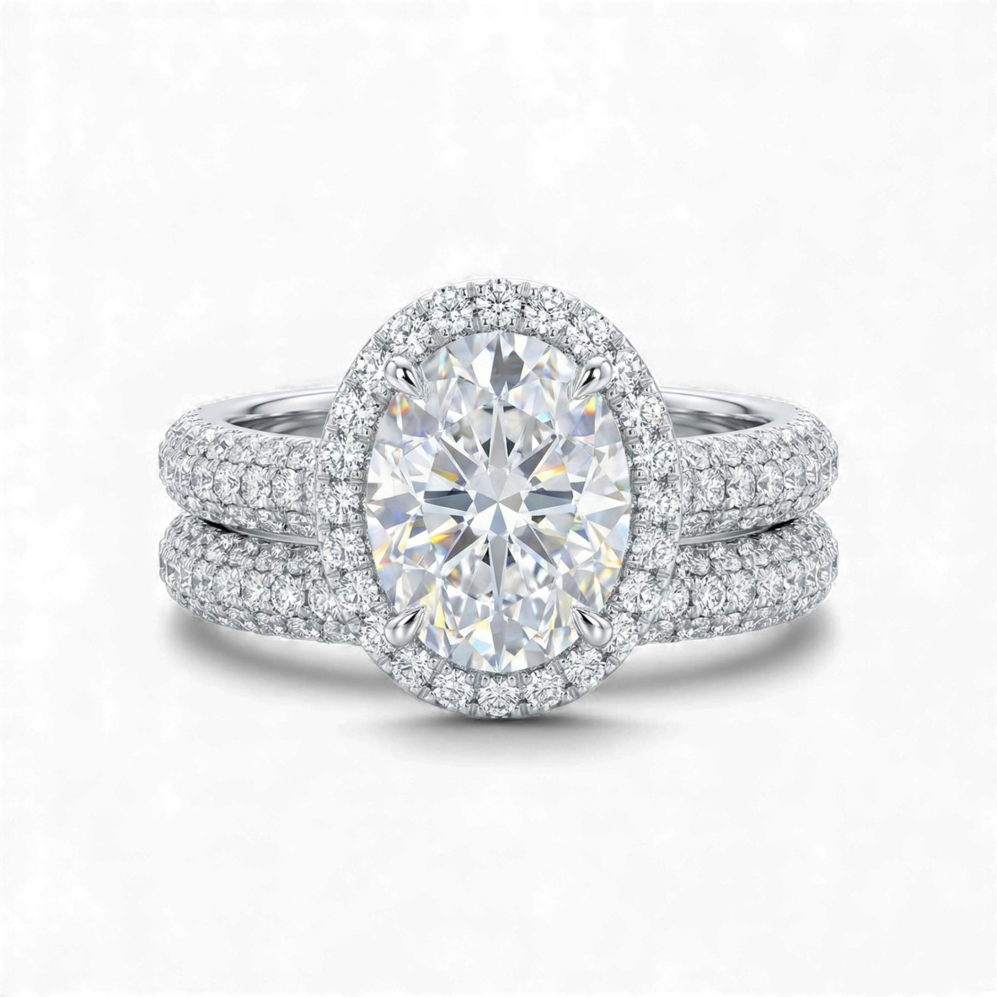 Diamond ring with a large central gemstone and smaller stones on a white background