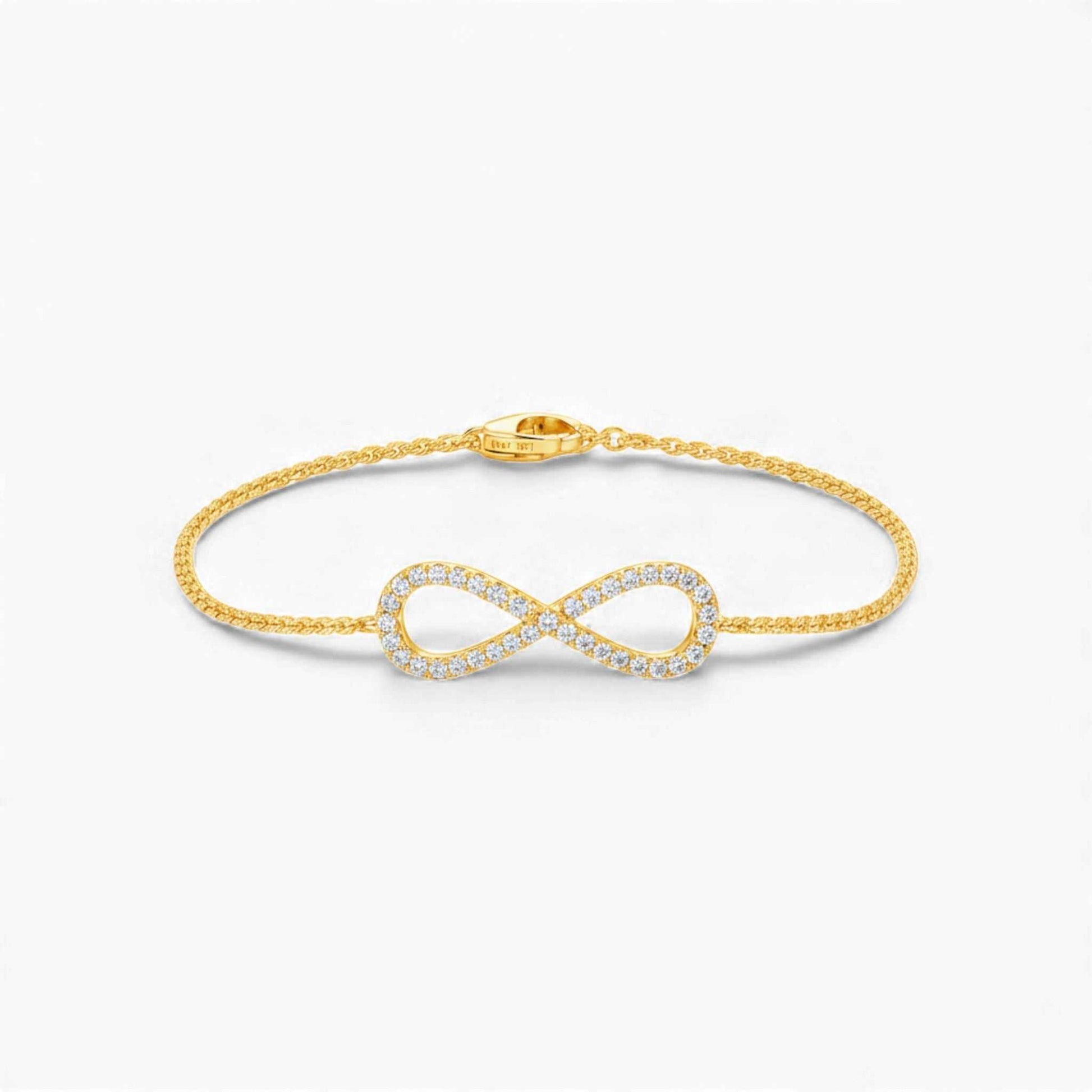 18KT gold infinity natural diamond bracelet with pavé-set round brilliant diamonds and adjustable cable chain clasp