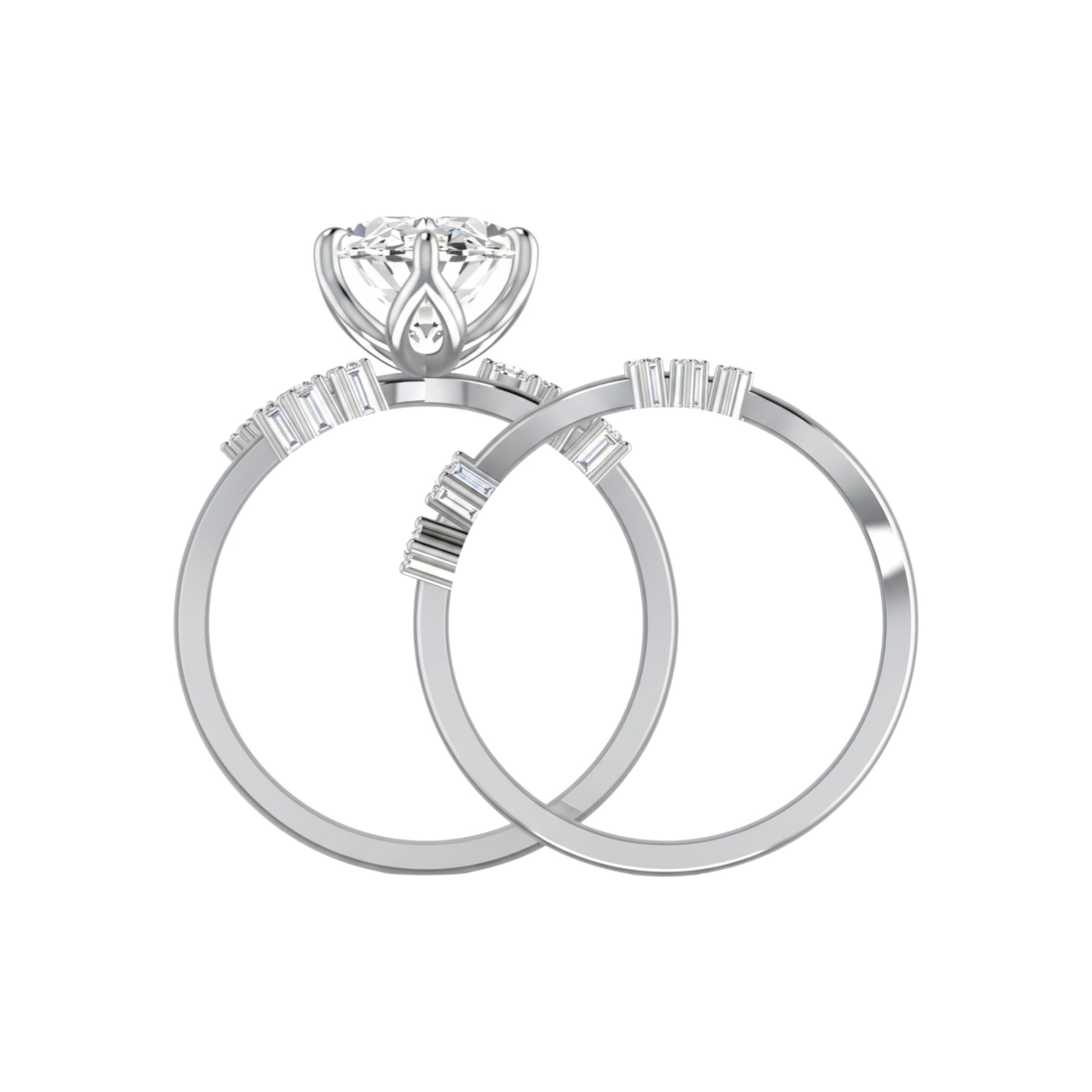 Pair of silver rings with diamond-like center stones on a white background