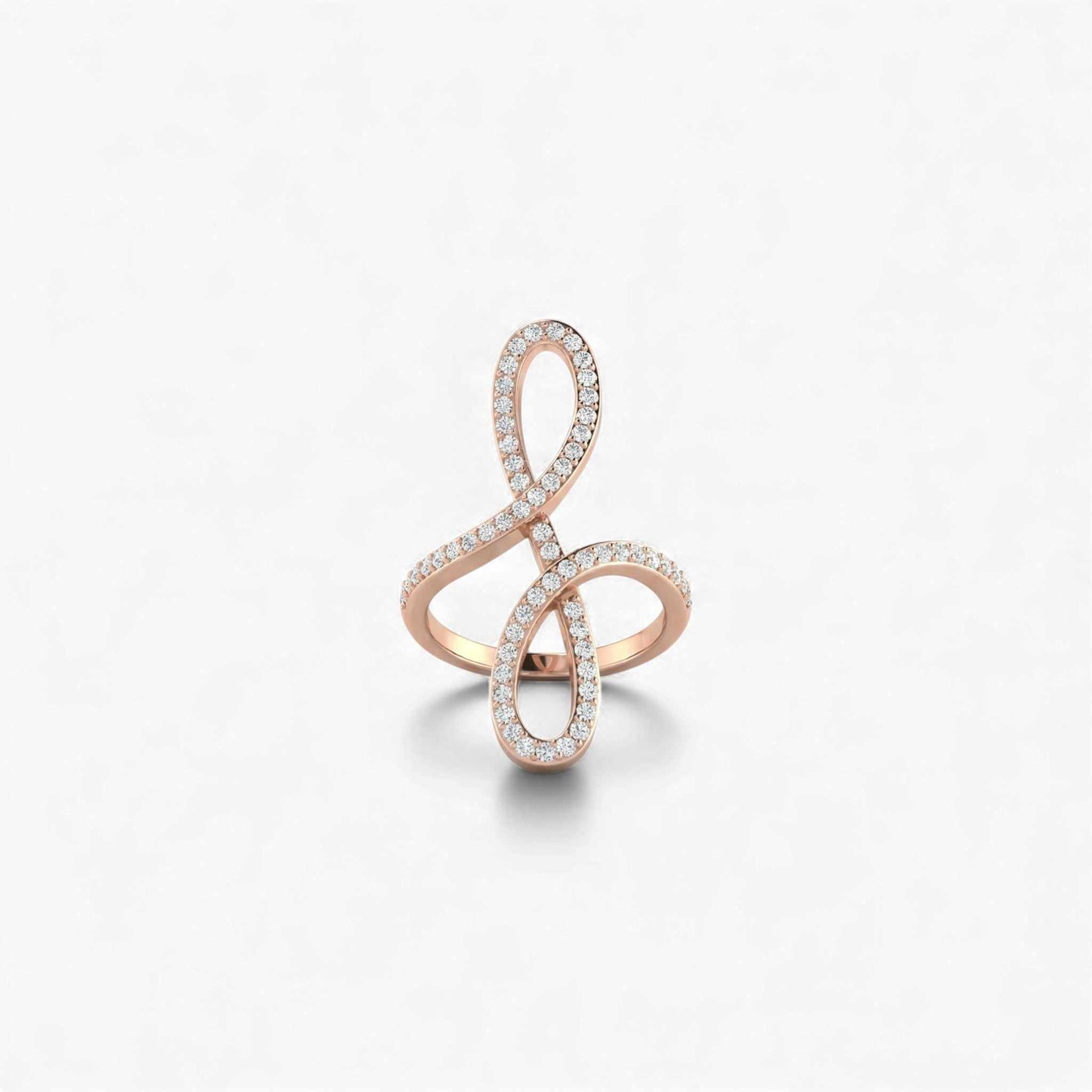 Rose gold ring with diamond accents on a light gray background