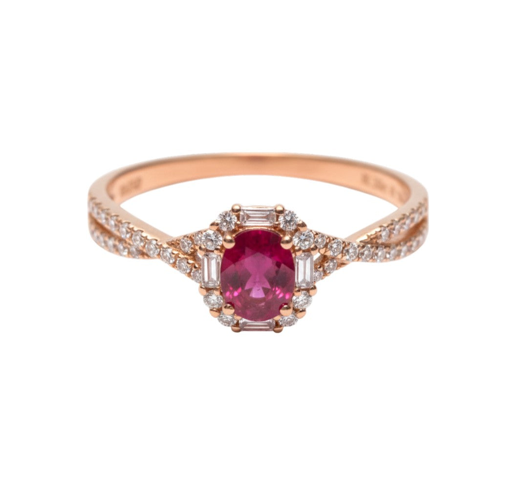 Rose gold ring with a pink gemstone and diamond accents on a white background
