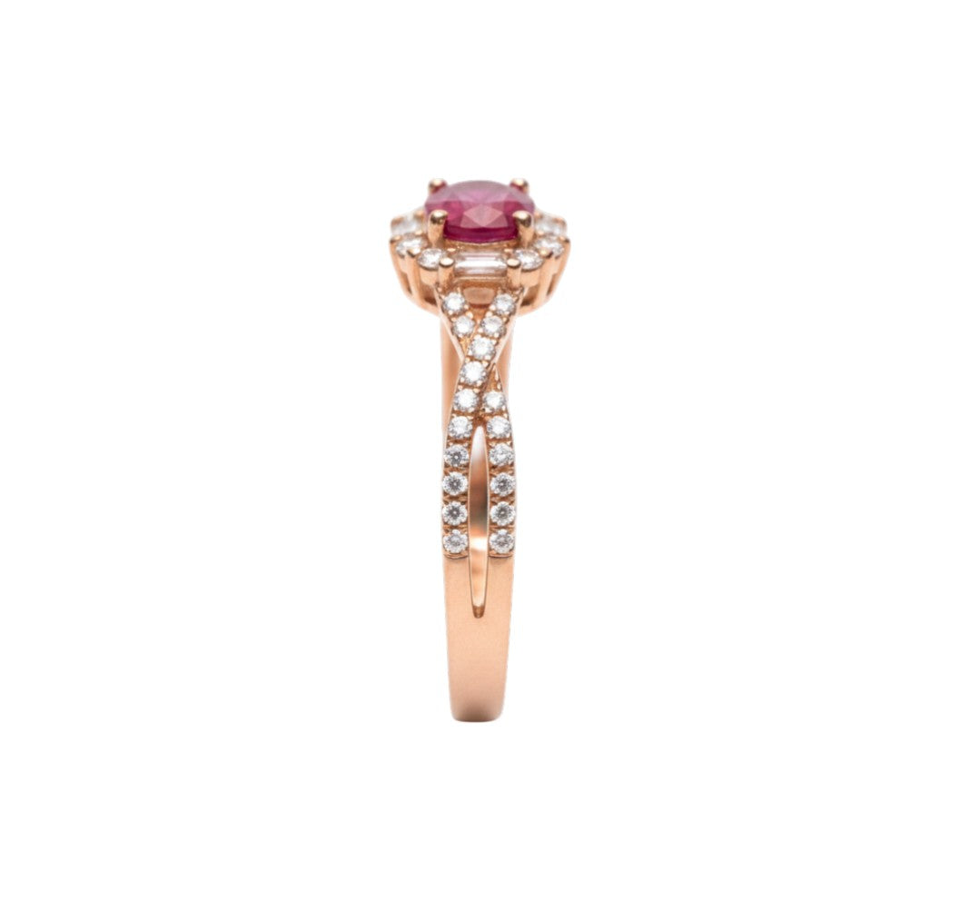Rose gold ring with a pink gemstone on a white background