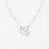 Silver dove-shaped pendant necklace on a white background
