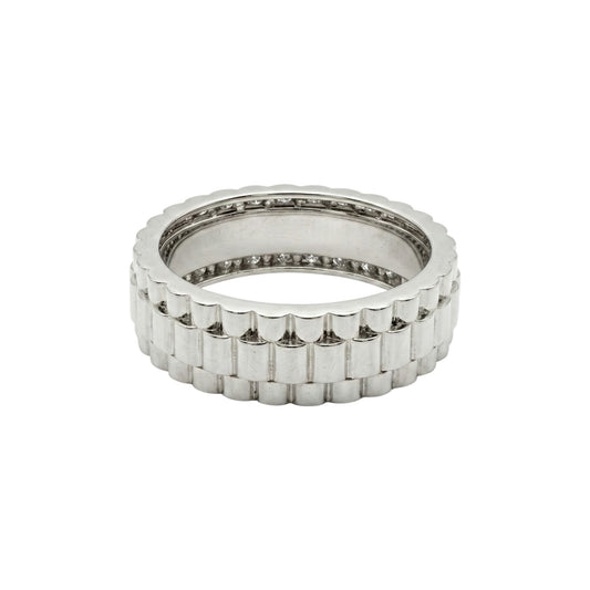 Silver ring with a textured band on a white background