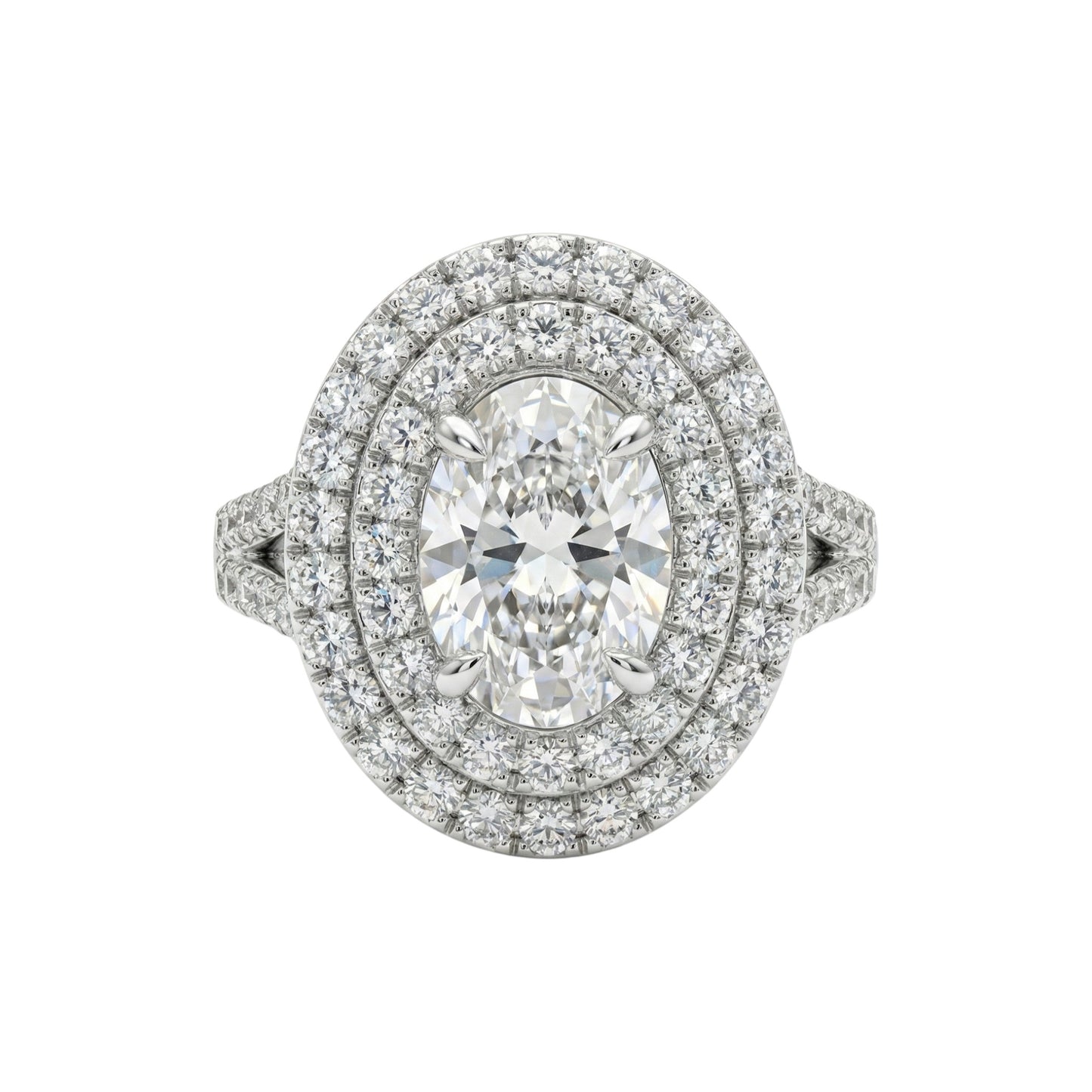 Diamond ring with a double halo on a white background