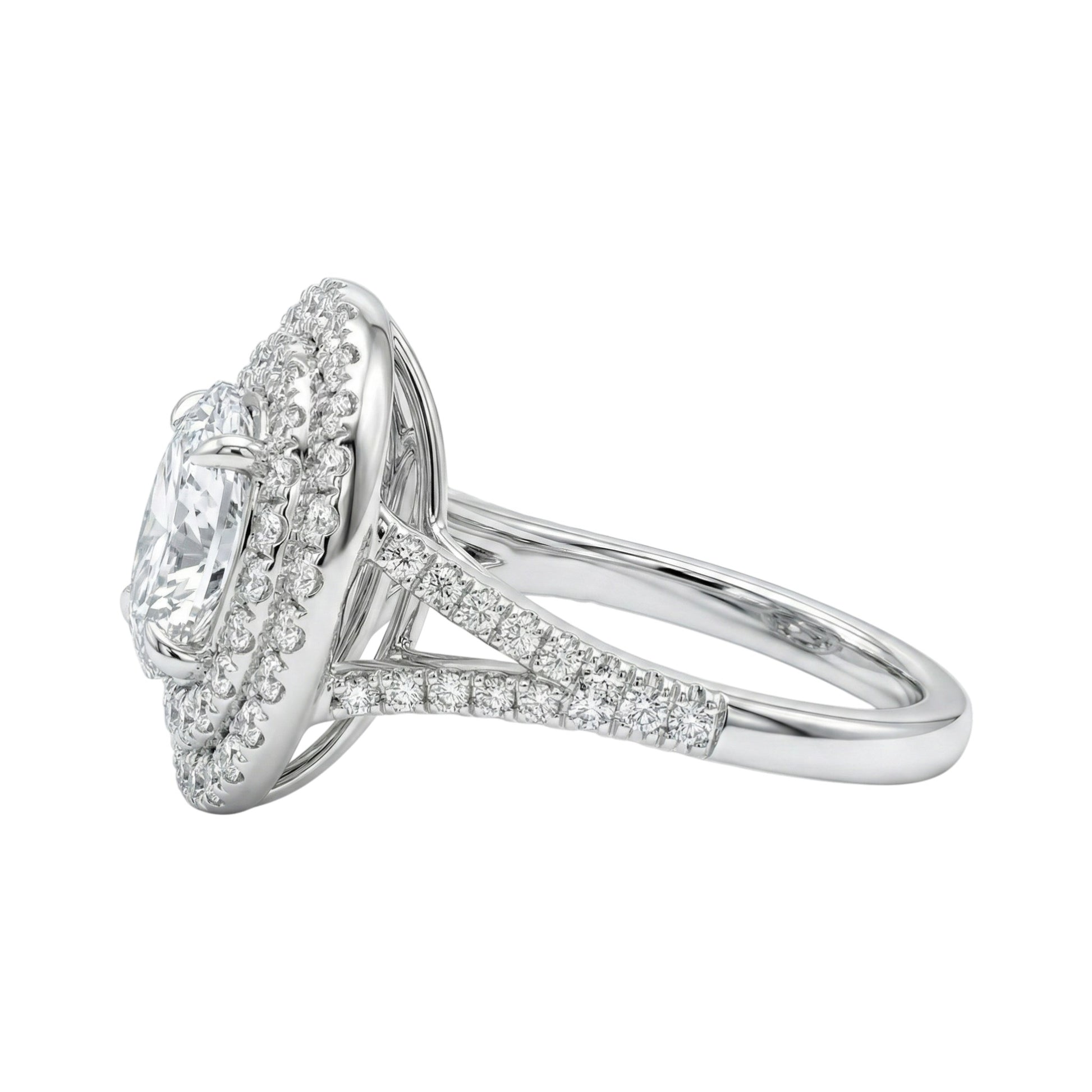 Diamond ring with a white gold band on a white background