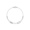 Silver bracelet with intricate design on a white background