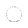Rose gold bracelet with diamond accents on a white background
