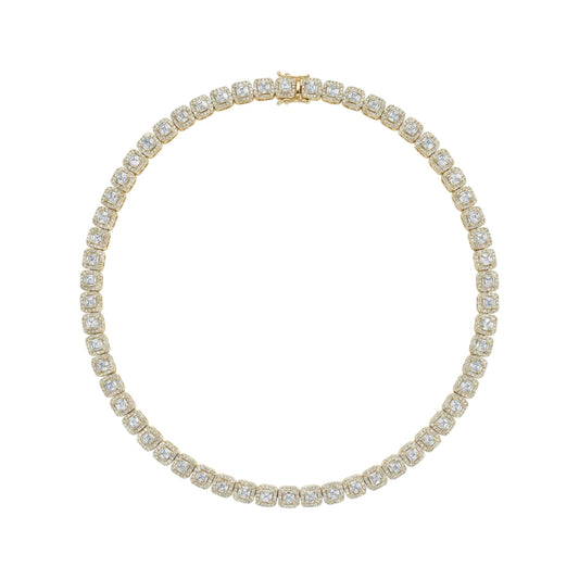 Gold bracelet with clear gemstones on a white background