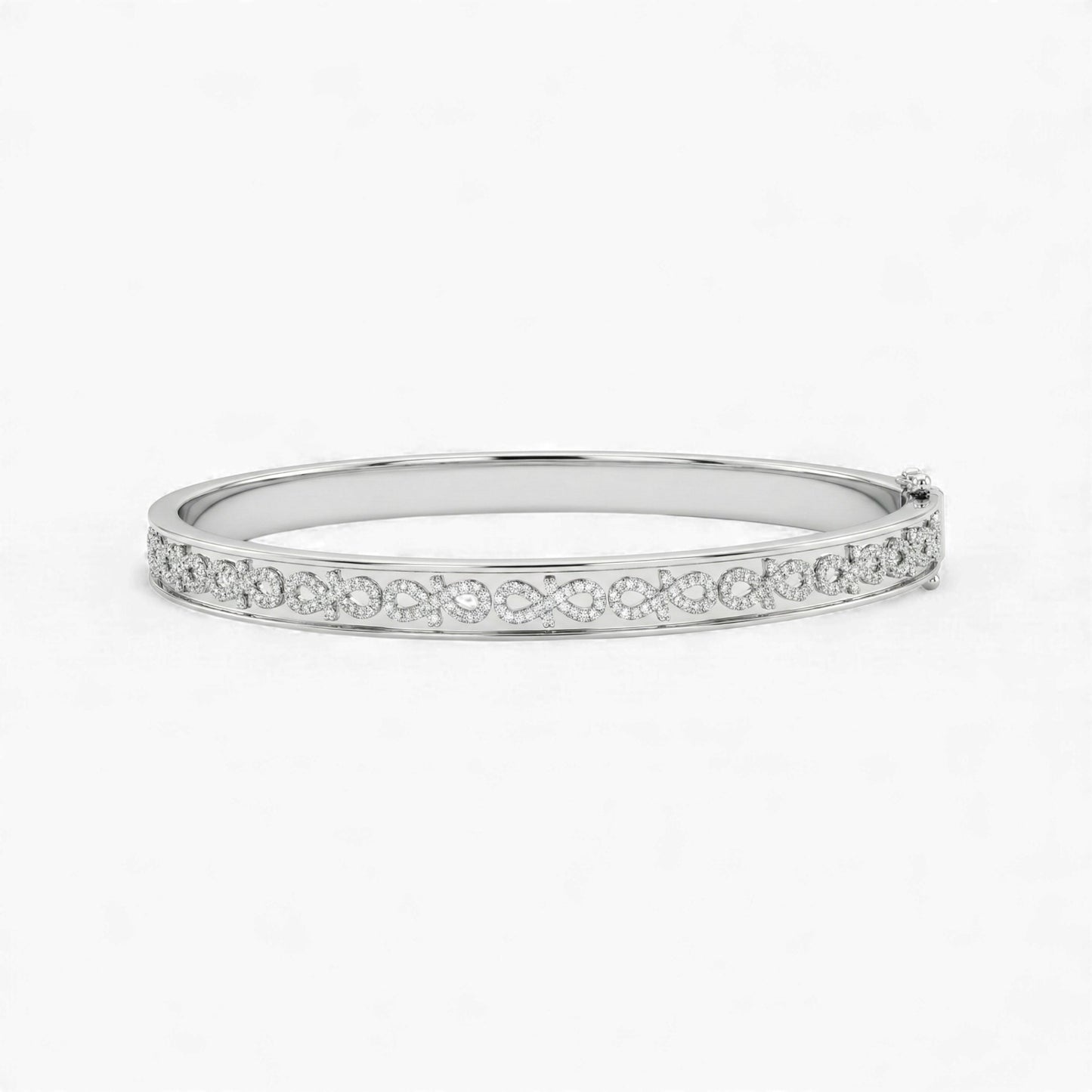 Silver bangle with small stones on a white background
