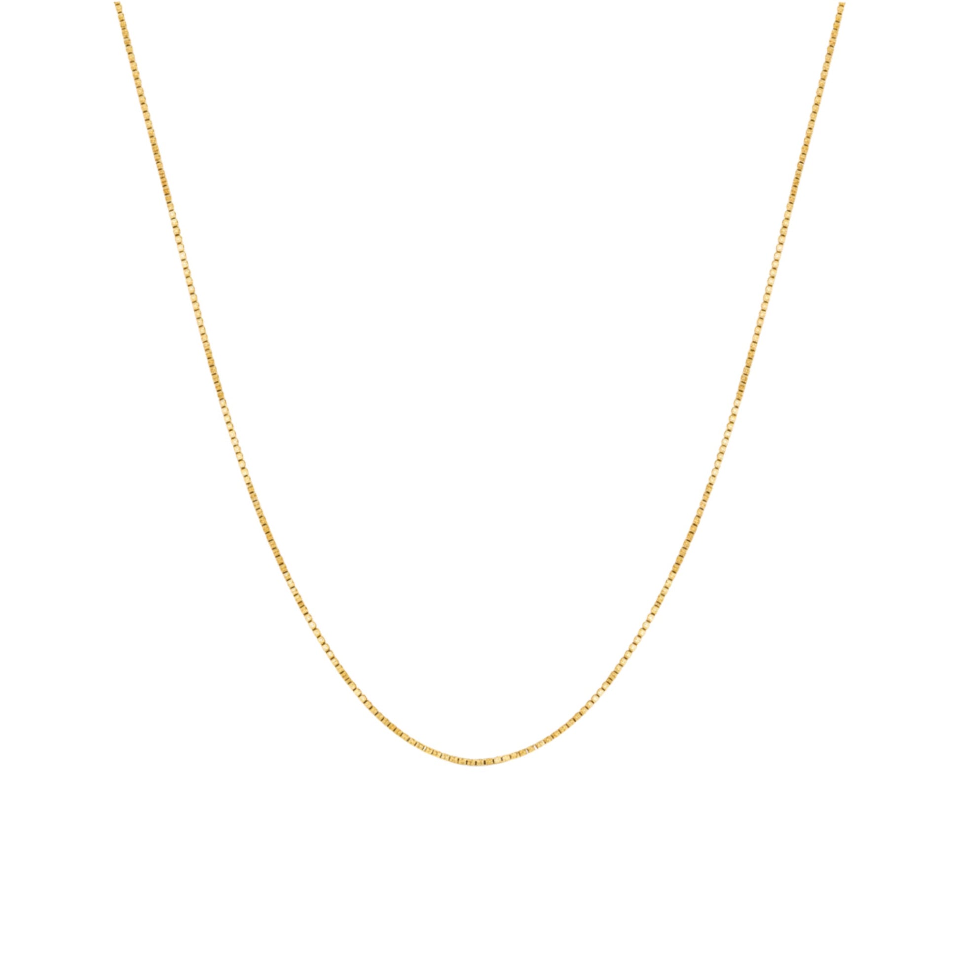 Gold chain necklace on a white background