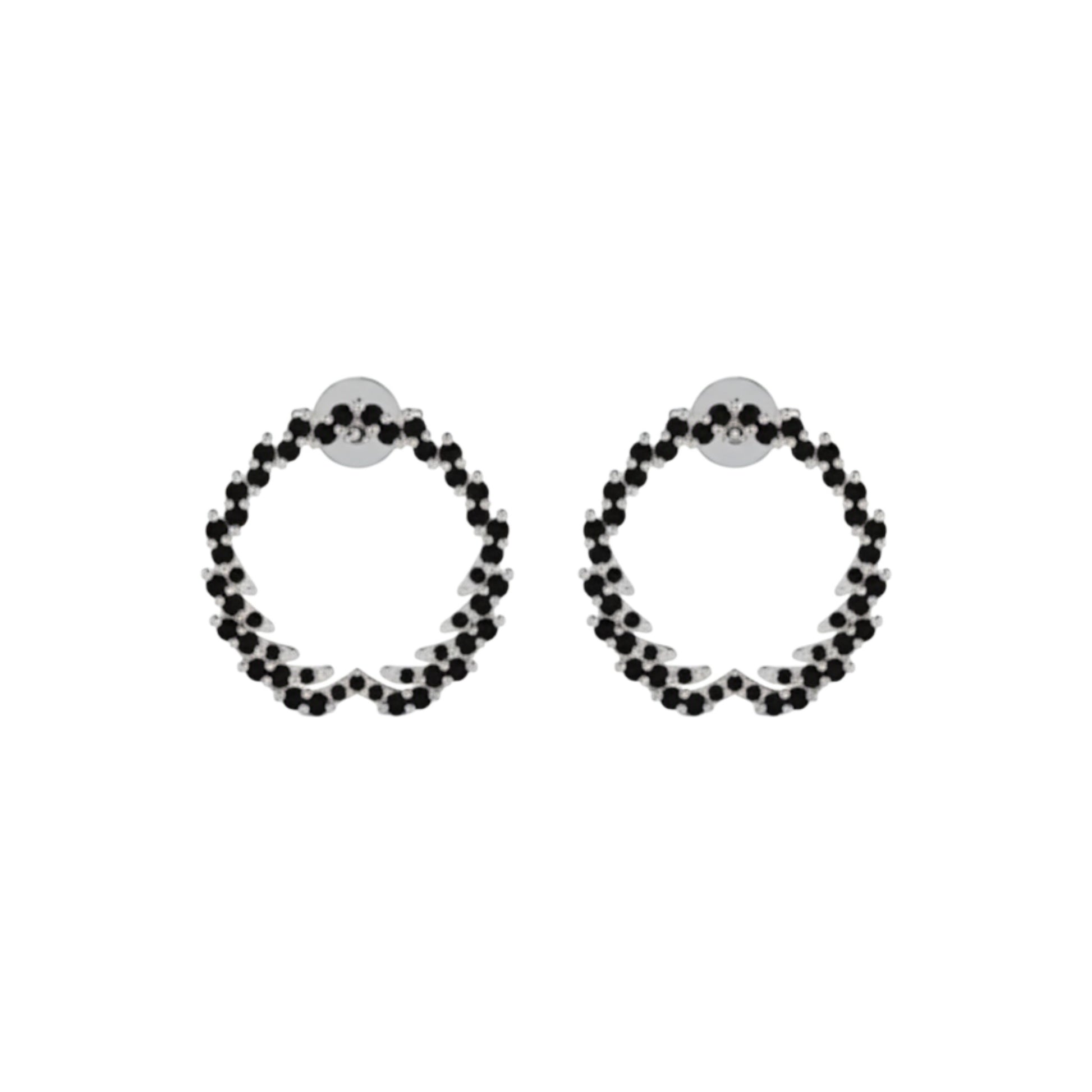 Pair of hoop earrings with black beads on a white background