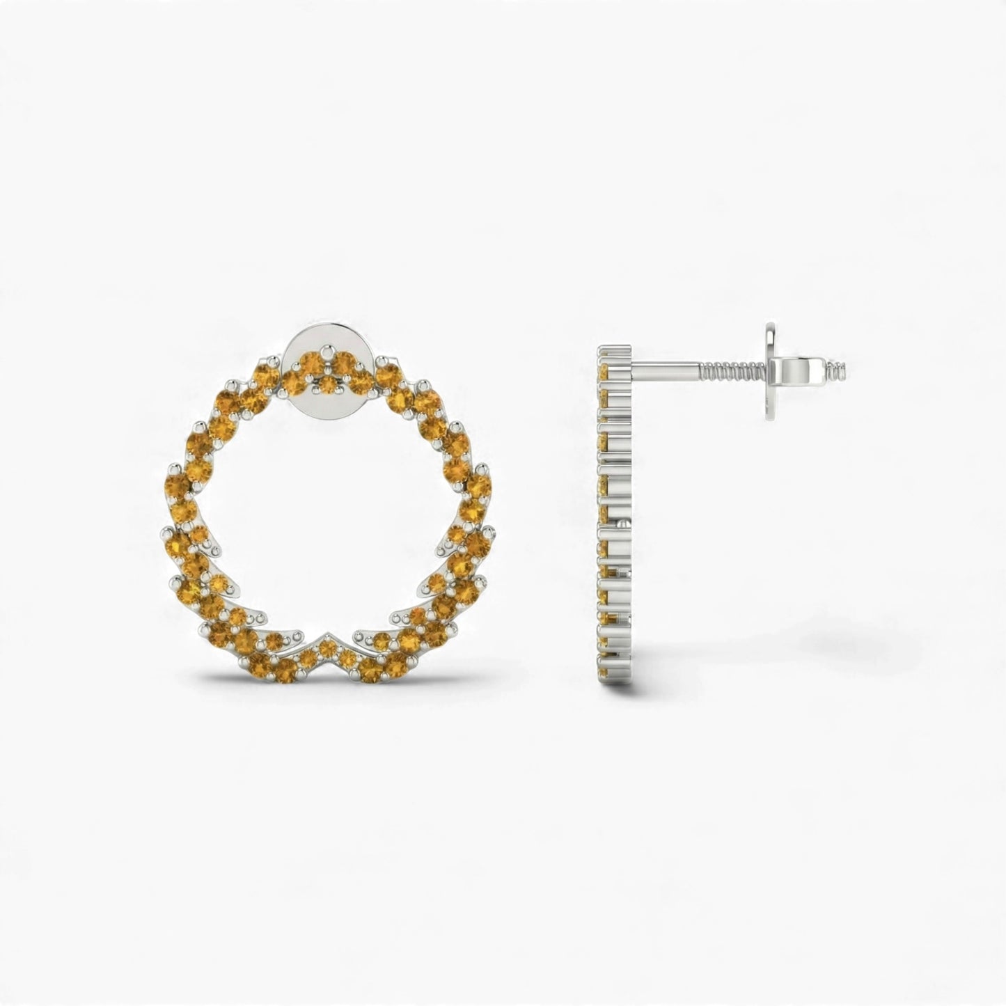 Hoop earrings with yellow gemstones on a white background