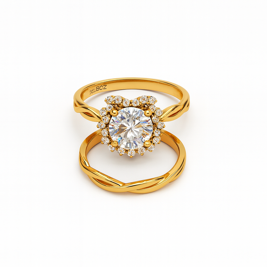 Gold ring with a large central gemstone and smaller stones on a white background