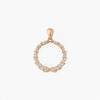 Rose gold pendant with diamond accents on a white background