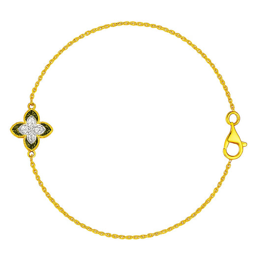 Gold bracelet with a floral clasp on a white background