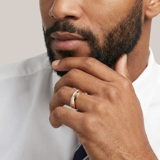 Man wearing a ring with a white background