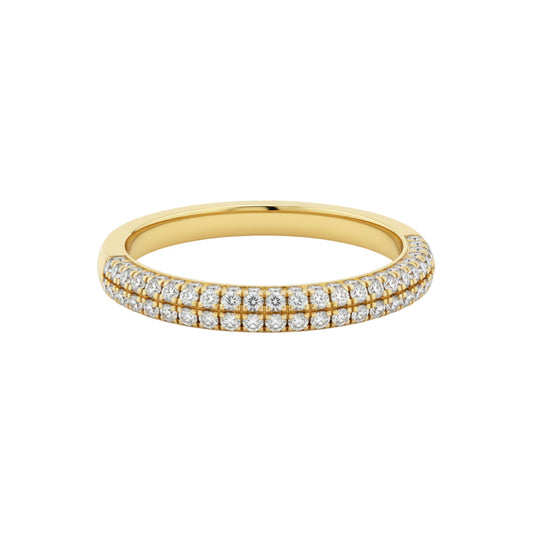 Gold ring with diamond accents on a white background